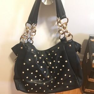 Black purse with rhinestone studs